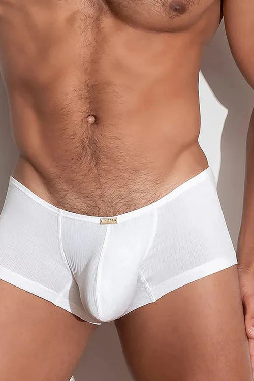 These White Trunks are made from viscose fabric for that amazing premium stretch, silky feel and breathable comfort. They offer flat-sewn seams for a chafe-free experience, invisible waistband, and hyper-comfy pouch for your bulge. Their gold-plated label on the front offers that undeniable luxury vibe
