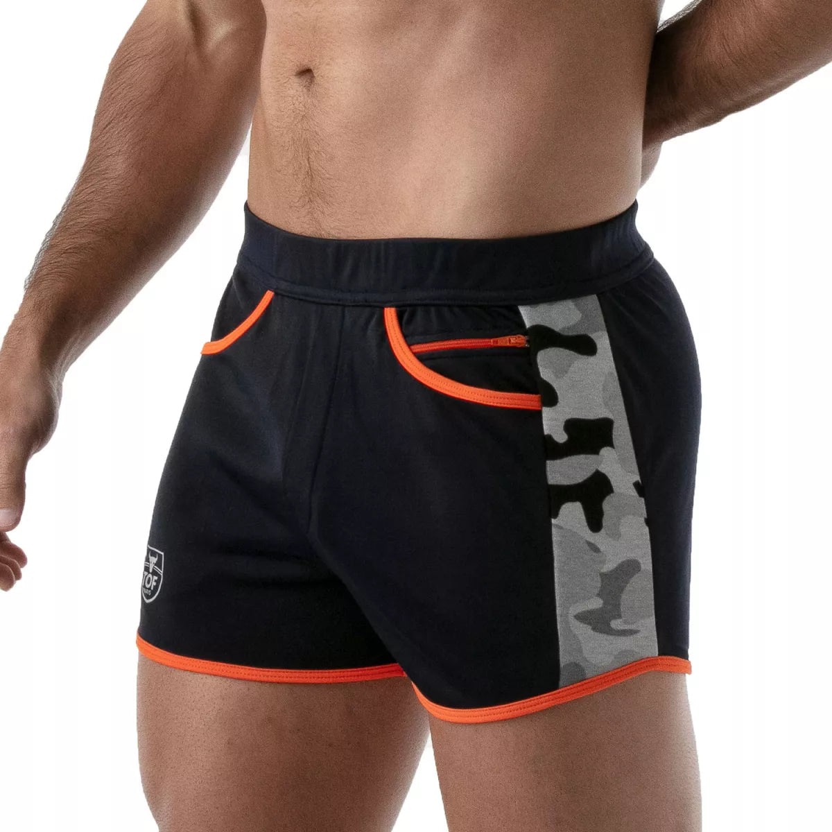 TOF's low-waisted, navy blue sport shorts have camouflage patterned sides, orange outline, and pockets including an additional zipper pocket. The shorts are made of antibacterial microfiber.