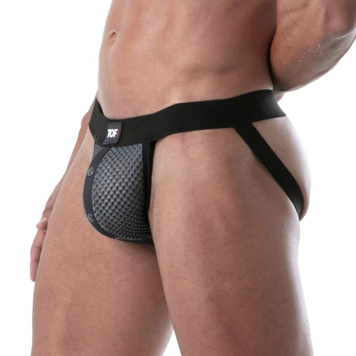 Black and gray snap jockstrap made from breathable 3D mesh. This jockstrap has a fitted front pocket that snaps in place.