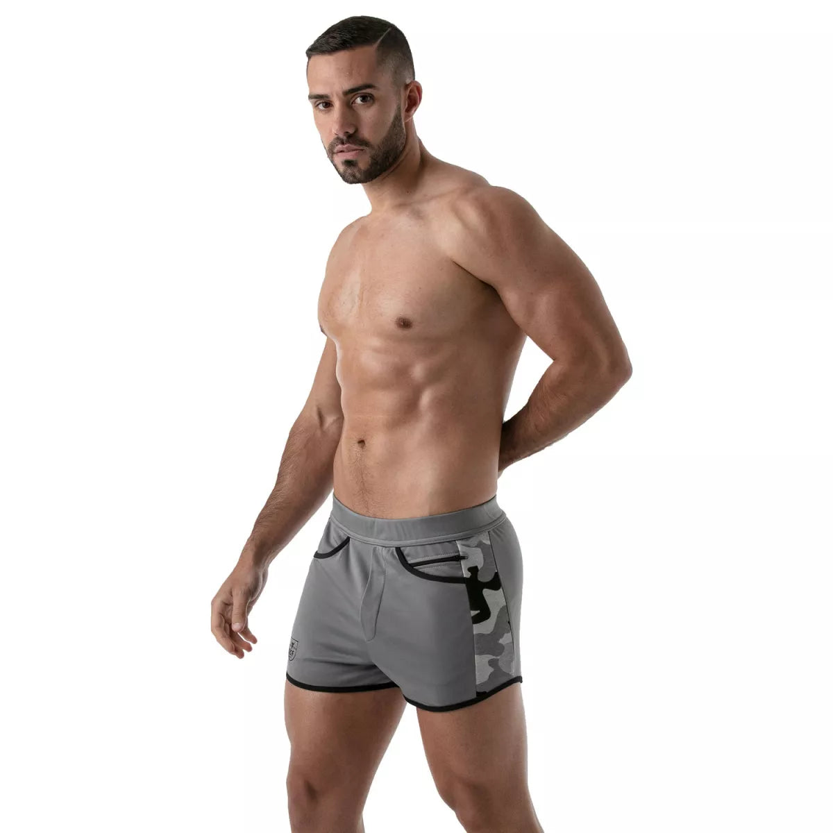 TOF's low-waisted, grey sport shorts have camouflage patterned sides, black outline, and pockets including an additional zipper pocket.  The shorts are made of antibacterial microfiber.