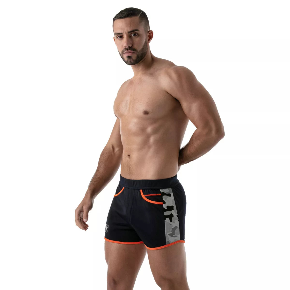 TOF's low-waisted, navy blue sport shorts have camouflage patterned sides, orange outline, and pockets including an additional zipper pocket.  The shorts are made of antibacterial microfiber.