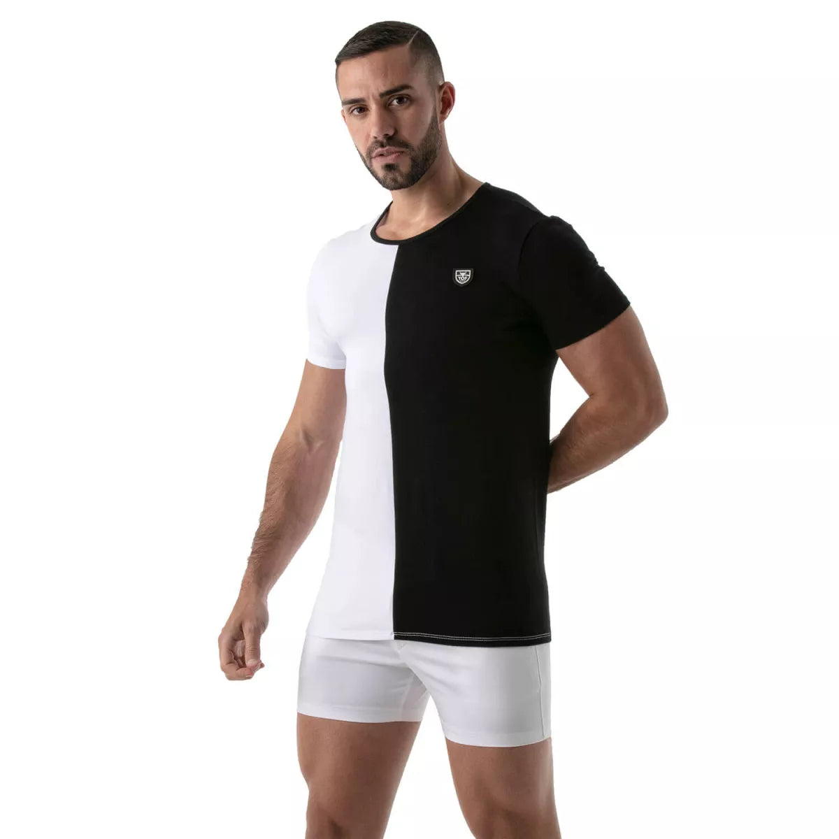 ToF's two-toned white and black, round-necked T-Shirt is made of soft, comfortable cotton jersey, with no seams on the side and TOF's logo sewn on the chest. 